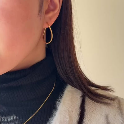 NEW＞K18オーバルツイストフープピアス